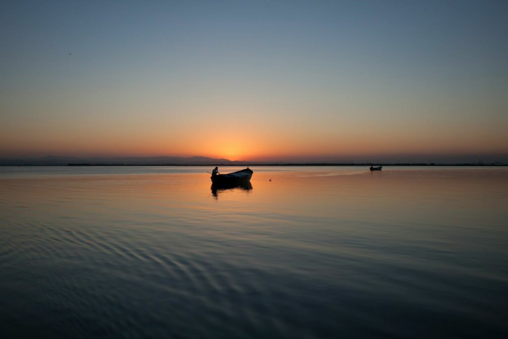 boat in the sunrise