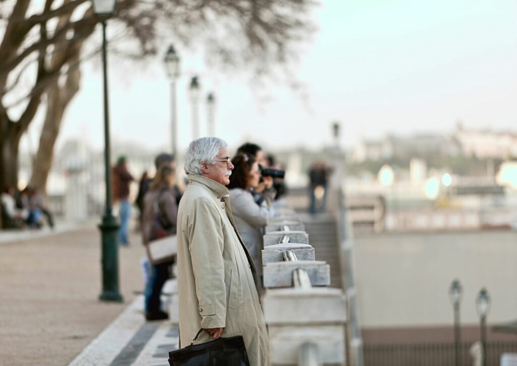 old man staring at a lookout